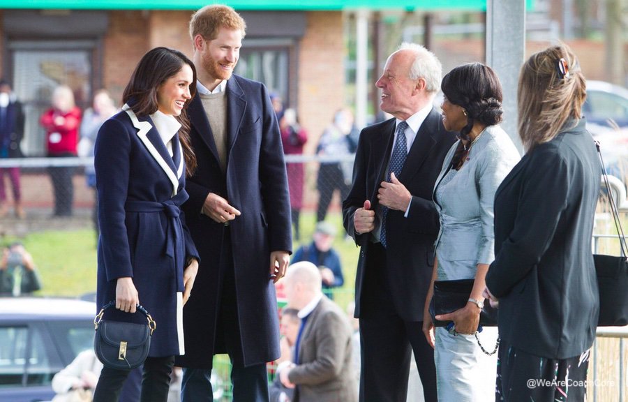 Meghan Markle carring her Altuzarra clutch bag in Birmingham